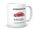 Ceramiczny kubek z nadrukiem Volkswagena Garbusa na biurku